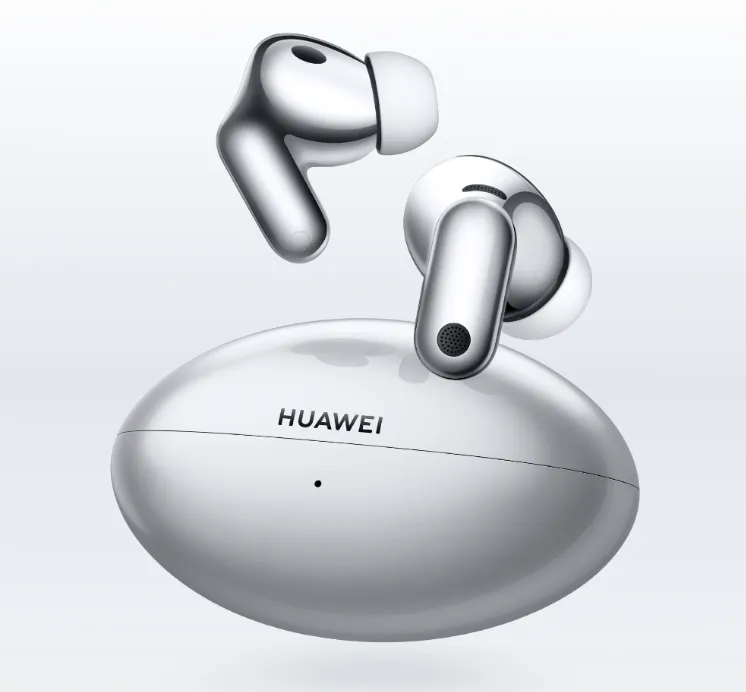 Auriculares Huawei FreeBuds Neo plateados junto al estuche de carga
