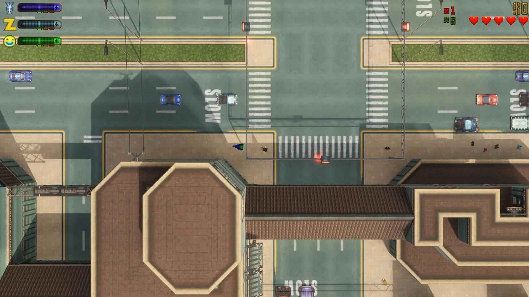 Vehículos en llamas sobre una avenida de GTA 2 con la iluminación del mod
