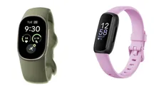 The Fitbit Edge in green next to the Fitbit Inspire 3 in pink, seen from the front