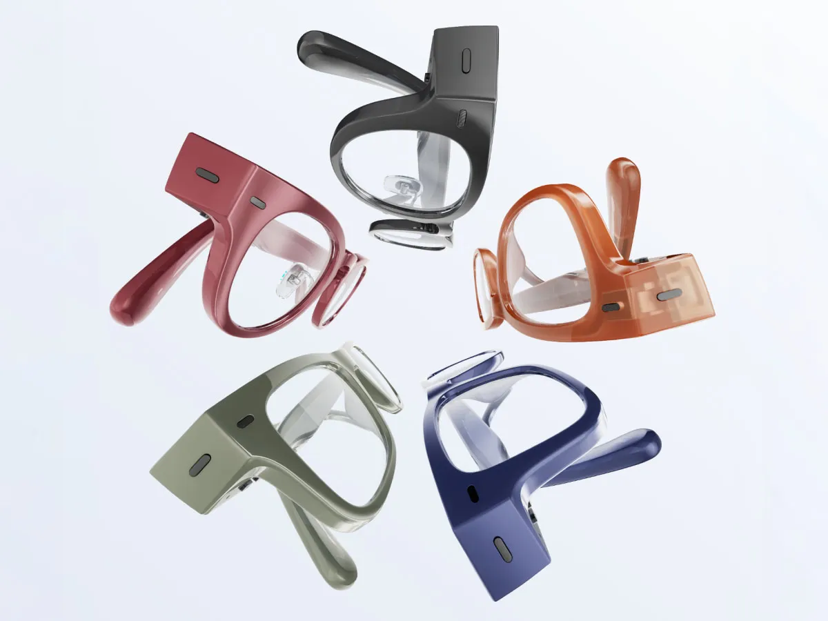 Las Nuance Audio Plus en sus cinco acabados —negro, granate, ámbar, verde oliva y azul— sobre fondo claro