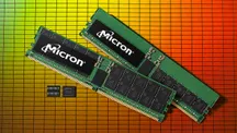 Two Micron memory modules with black labels on a yellow and orange grid, next to two smaller memory chips from the same brand