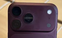 Close-up of the camera module on a Burgundy iPhone 18 Pro Max, with the area around the lenses lighter in colour