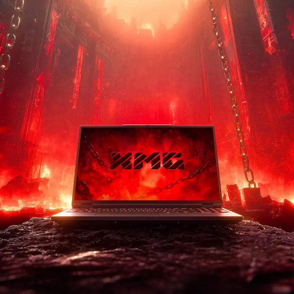 Portátil XMG APEX 16 abierto sobre una superficie oscura