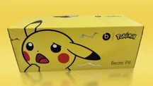 Altavoz Beats Pill junto a los iconos de Beats y una Poké Ball en el teaser de la colaboración con Pokémon