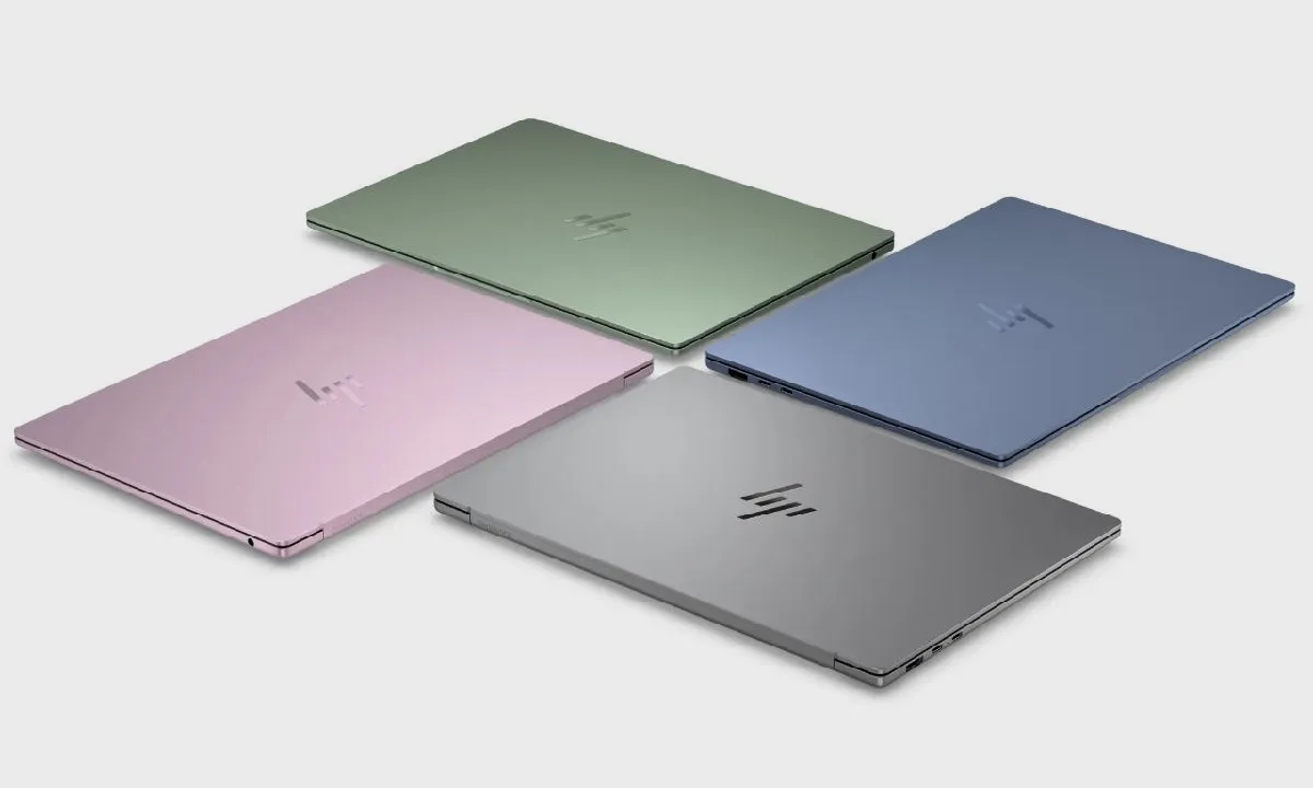 Cuatro unidades del HP OmniBook 5 con la tapa cerrada en verde, azul, rosa y gris