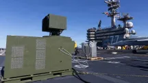 AeroVironment palletized LOCUST laser on the flight deck of the aircraft carrier USS George H.W. Bush (CVN 77)