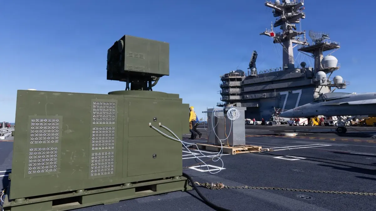 AeroVironment palletized LOCUST laser on the flight deck of the aircraft carrier USS George H.W. Bush (CVN 77)
