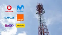 Logotipos de Vodafone, Movistar, DIGI, Orange, Yoigo y MásMóvil junto a una antena de telecomunicaciones