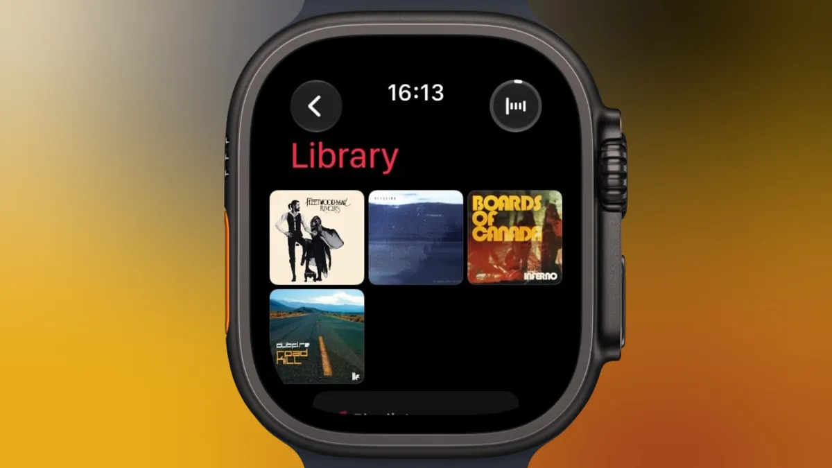 Pantalla de la biblioteca de la app Música en un Apple Watch, con varias portadas de álbumes en cuadrícula