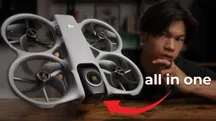DJI Avata 360 drone held up for the test, with pilot Kai Vertigoh blurred in the background
