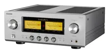 Luxman L-100 Centennial integrated amplifier in a silver finish, with its analogue VU meters and the Class-A logo