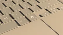 Copilot key highlighted on an ASUS Zenbook A16 laptop keyboard