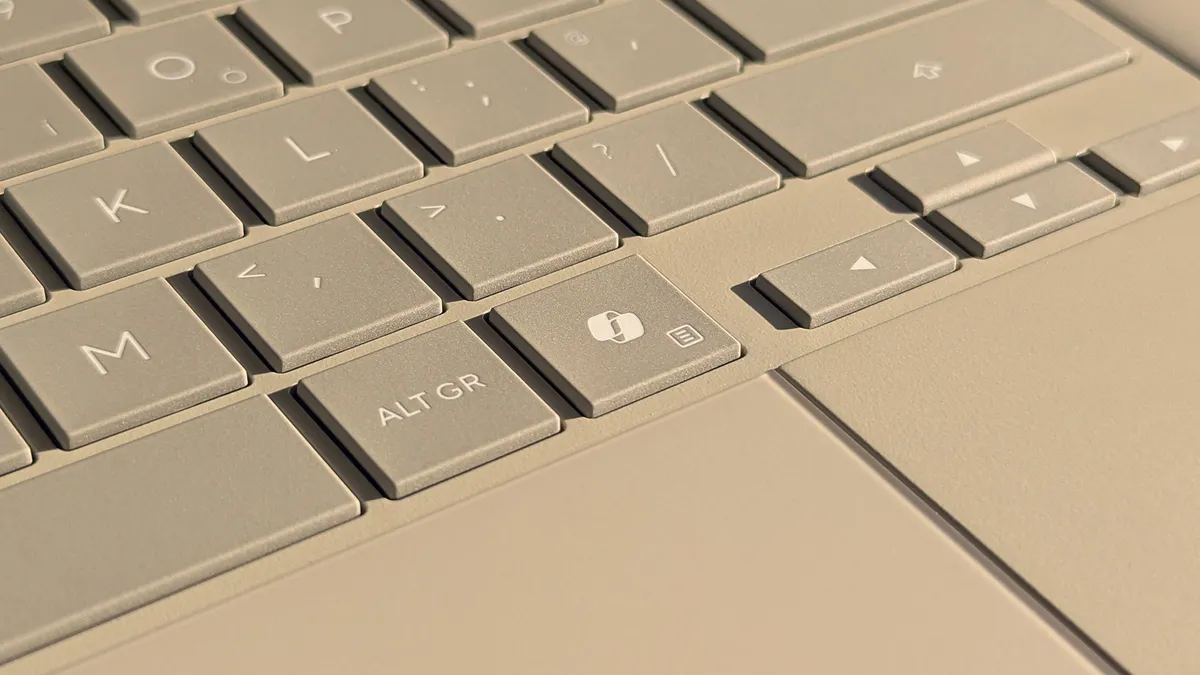Copilot key highlighted on an ASUS Zenbook A16 laptop keyboard