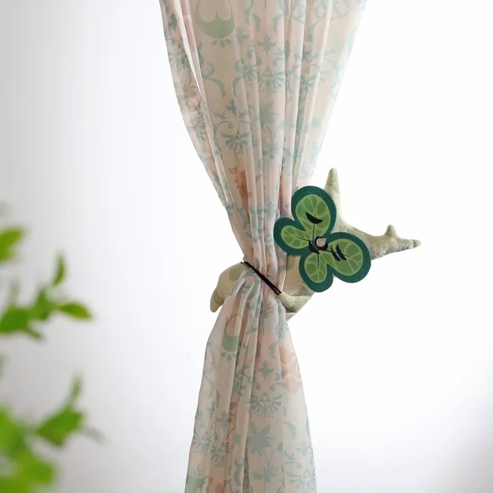 Sujeta cortinas con forma de kolog