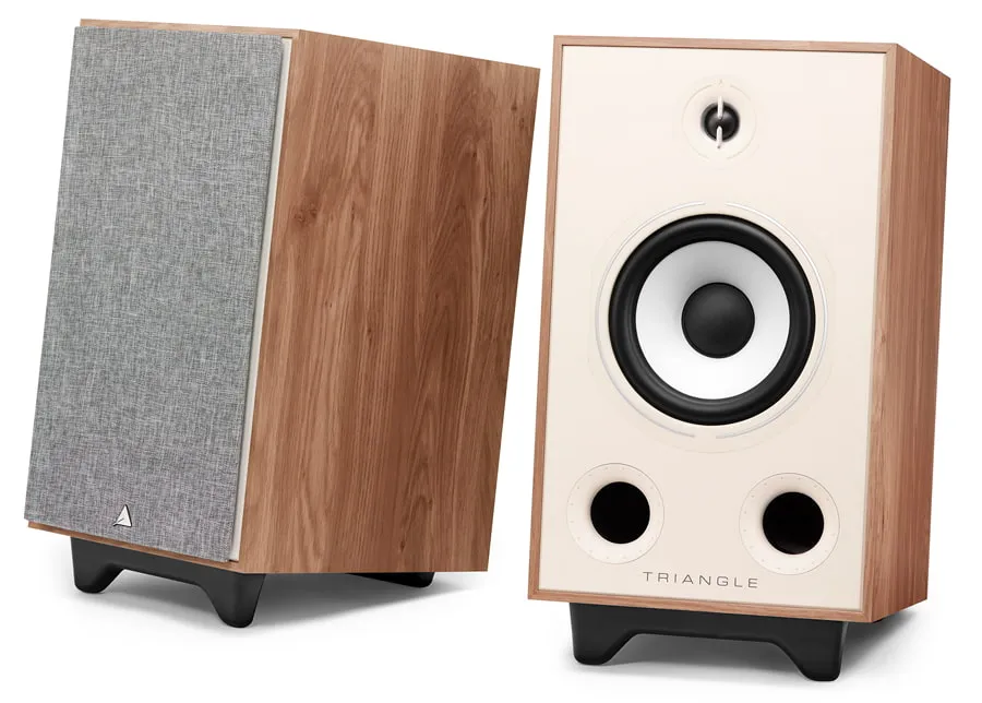 Borea BR05 speakers in light oak, one with its fabric grille and the other showing the drivers and two front ports