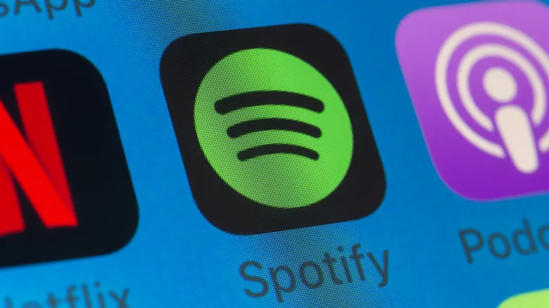 Icono de la app de Spotify en la pantalla de un iPhone