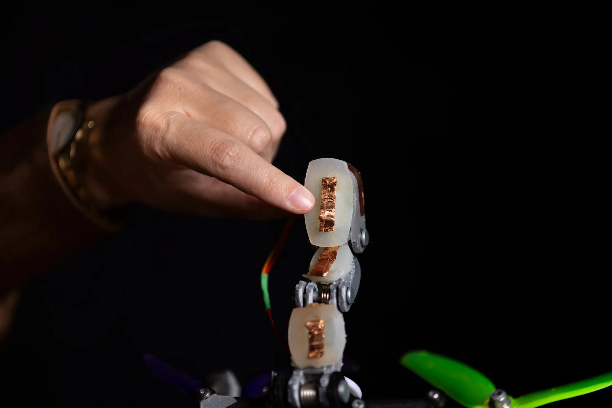 Close-up of the silicone tactile sensors on the drone’s fingers