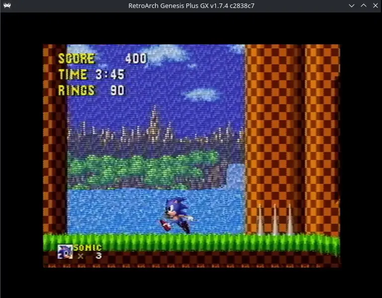 Fotograma de Sonic con el shader NTSC activado, con la cascada fundida con el fondo